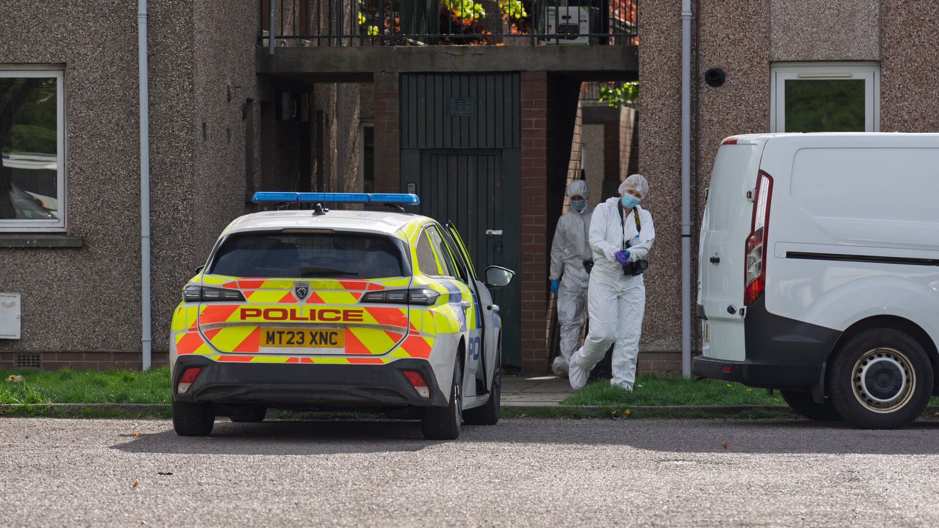 Forensic teams were pictured leaving the property.