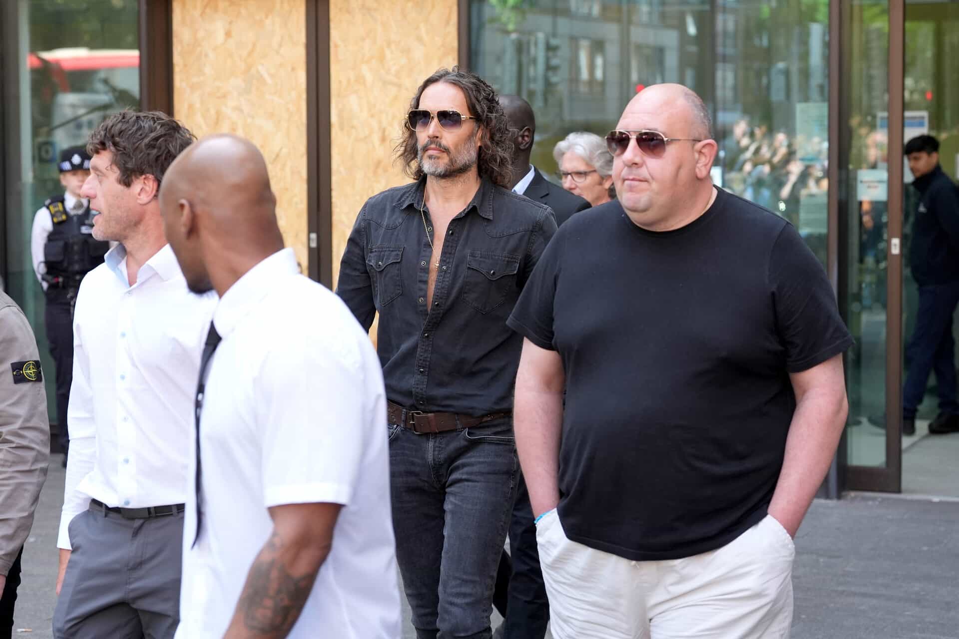 Russell Brand leaving Westminster Magistrates’ Court on Friday (Lucy North/PA)