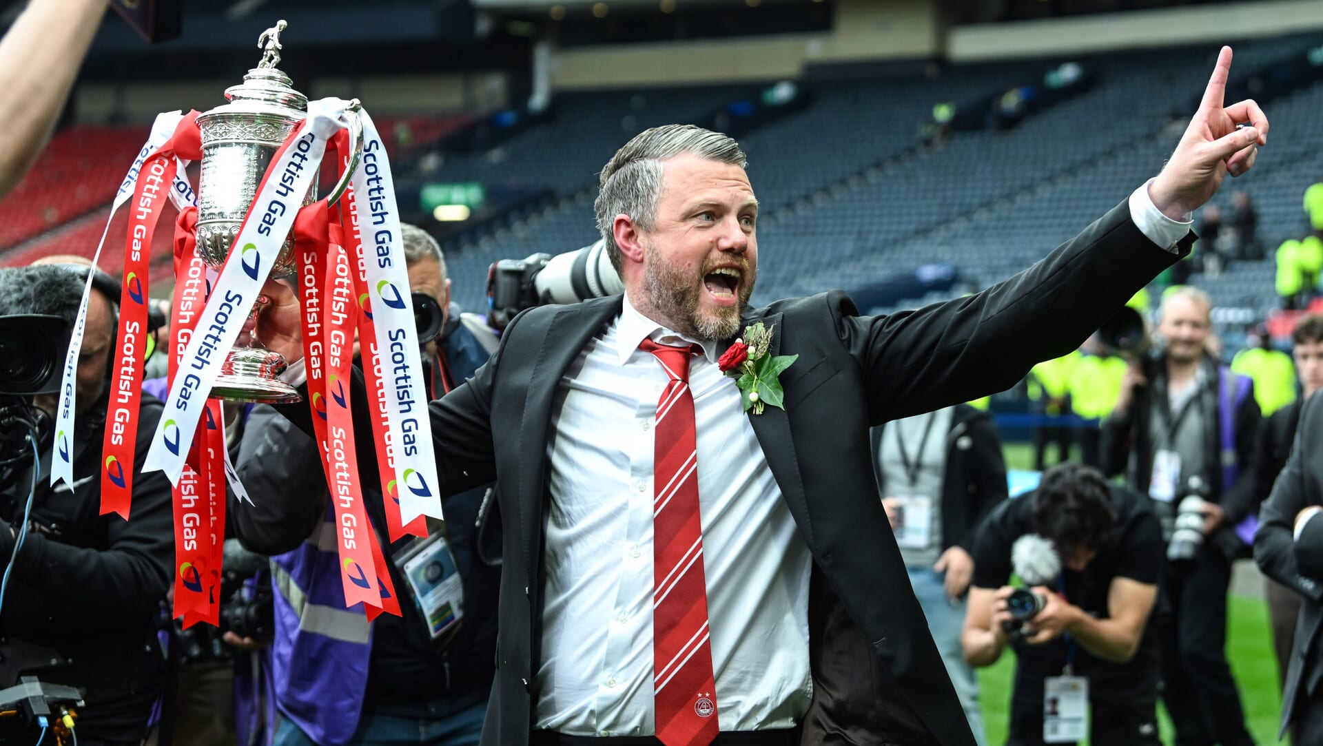 GLASGOW, SCOTLAND - MAY 24: Aberdeen manager Jimmy Thelin with the Scottish Cup trophy during the Scottish Gas Men's Scottish Cup Final between Aberdeen and Celtic at Hampden Park, on May 24, 2025, in Glasgow, Scotland. (Photo by Rob Casey / SNS Group)
