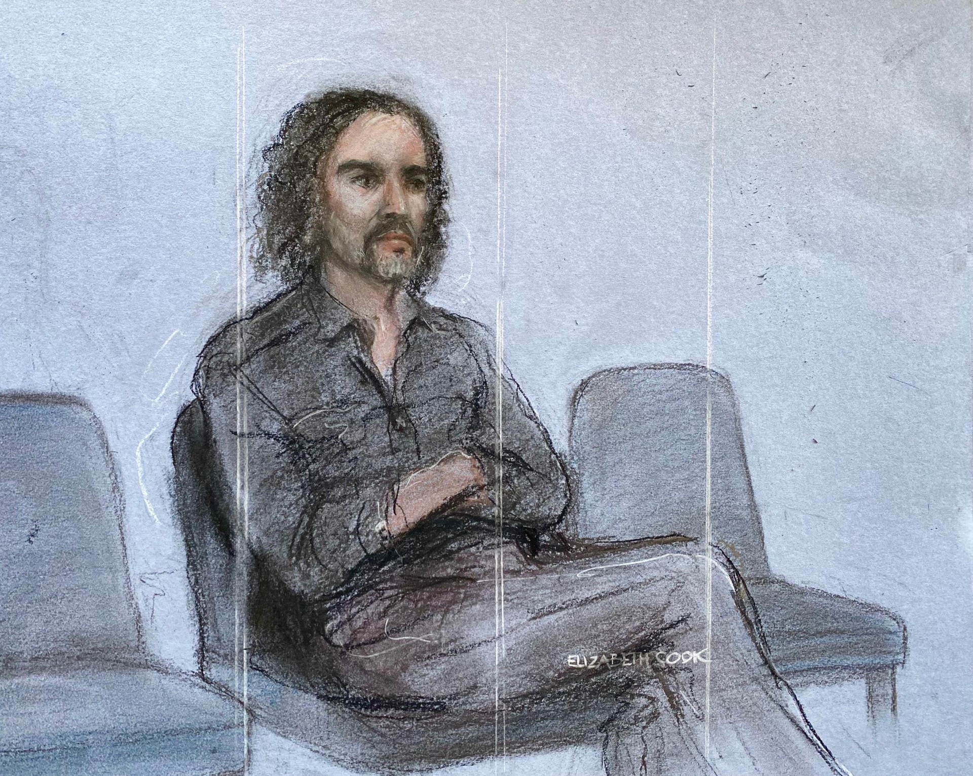 Court artist sketch of Russell Brand appearing in the dock (Elizabeth Cook/PA).