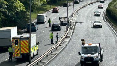 Car flipped onto roof in crash on Clydeside Expressway in Glasgow
