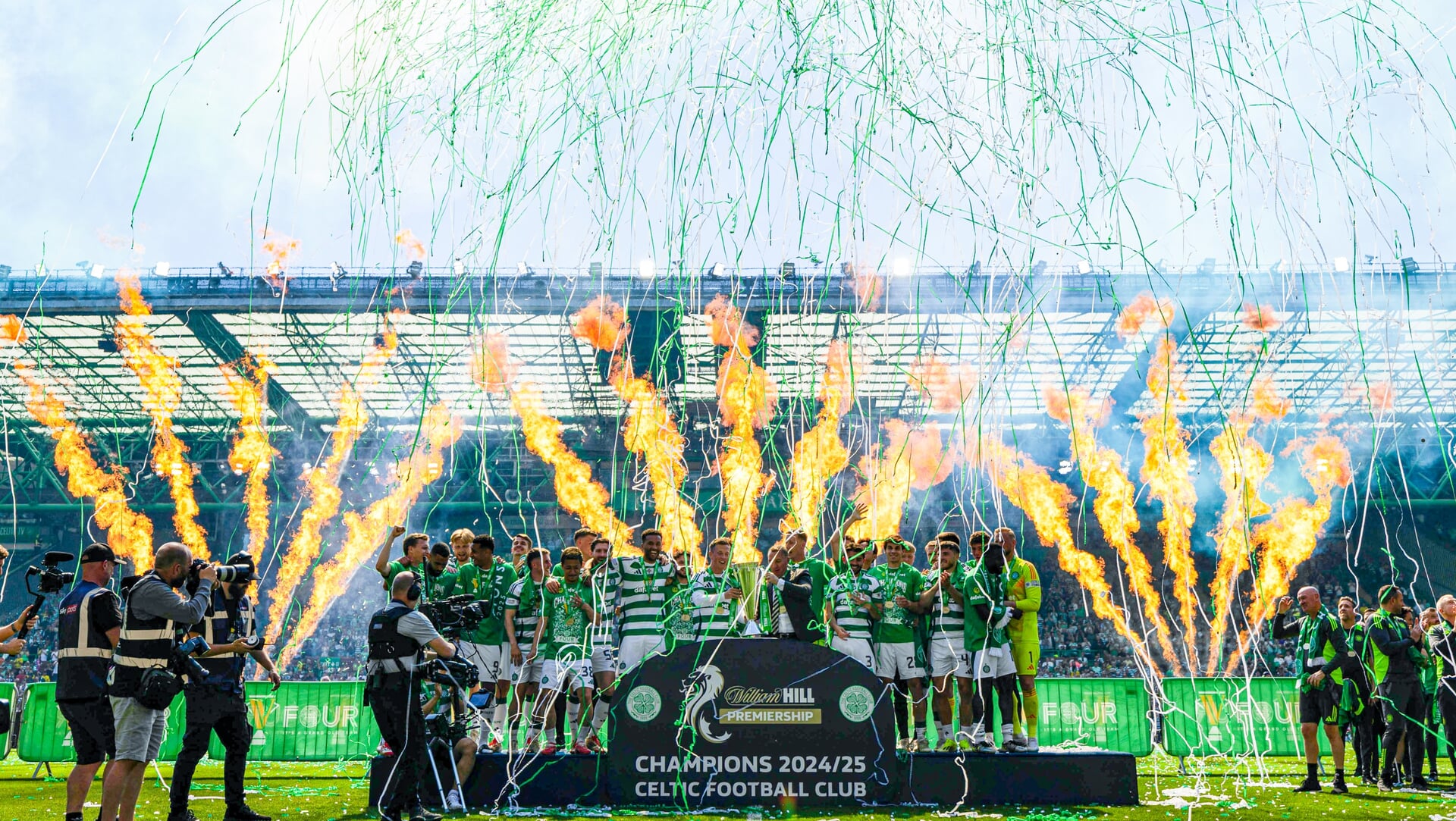 GLASGOW, SCOTLAND - MAY 17: Celtic lift the trophy at full time during a William Hill Premiership match between Celtic and St Mirren at Celtic Park, on May 17, 2025, in Glasgow, Scotland. (Photo by Ross MacDonald / SNS Group)