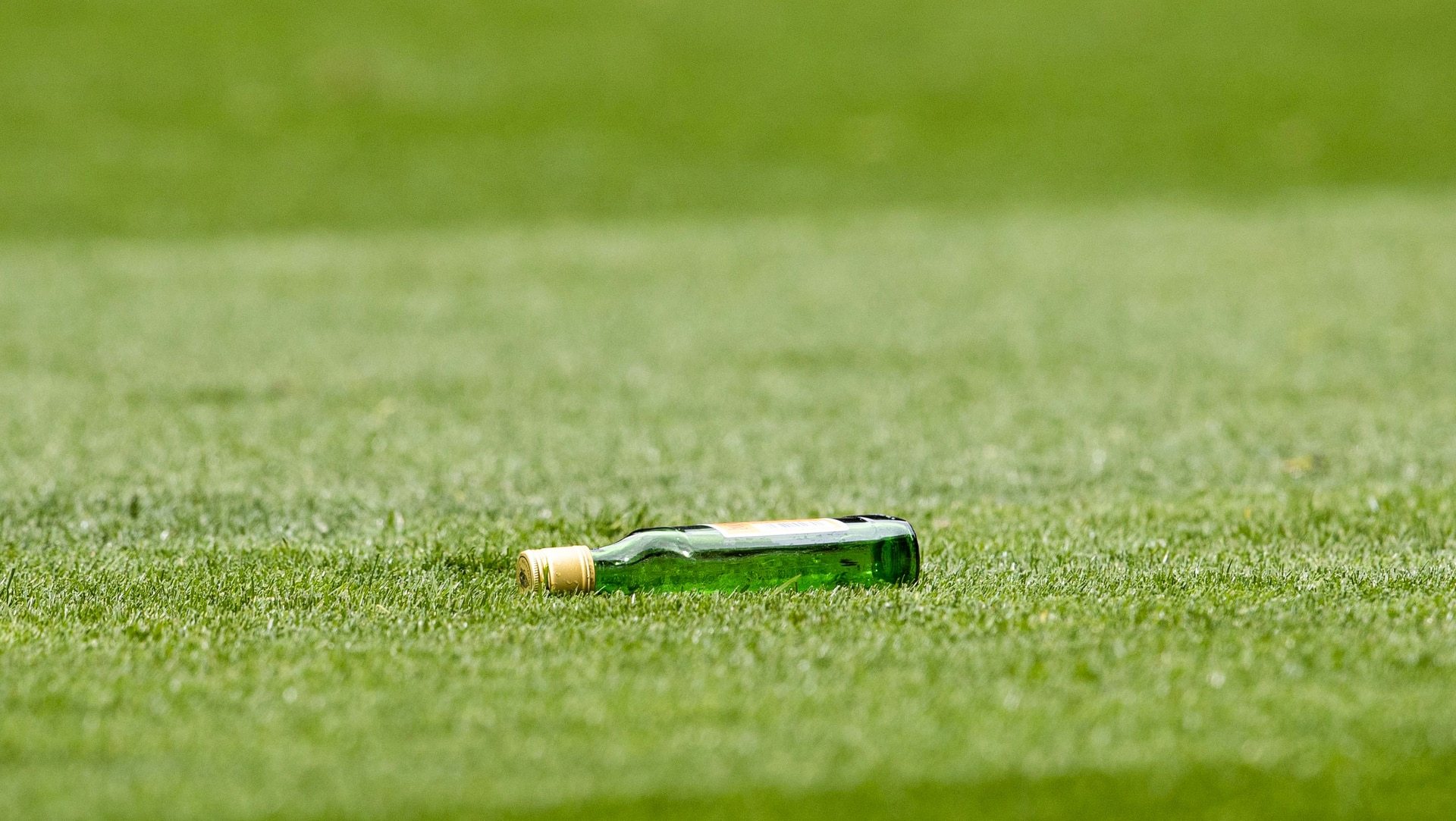 A bottle of Buckfast which was thrown onto the pitch by fans at Celtic's Viljami Sinisalo during a William Hill Premiership match between Rangers and Celtic at Ibrox on May 4, 2025.