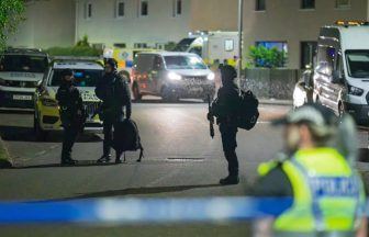Man arrested after armed police lock down street in Moray