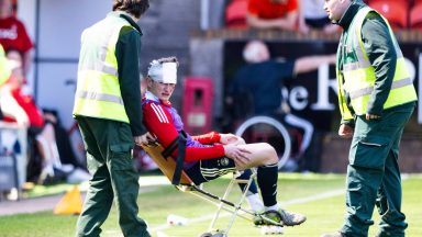 Aberdeen’s Jack MacKenzie injured after being struck by seat thrown by own support