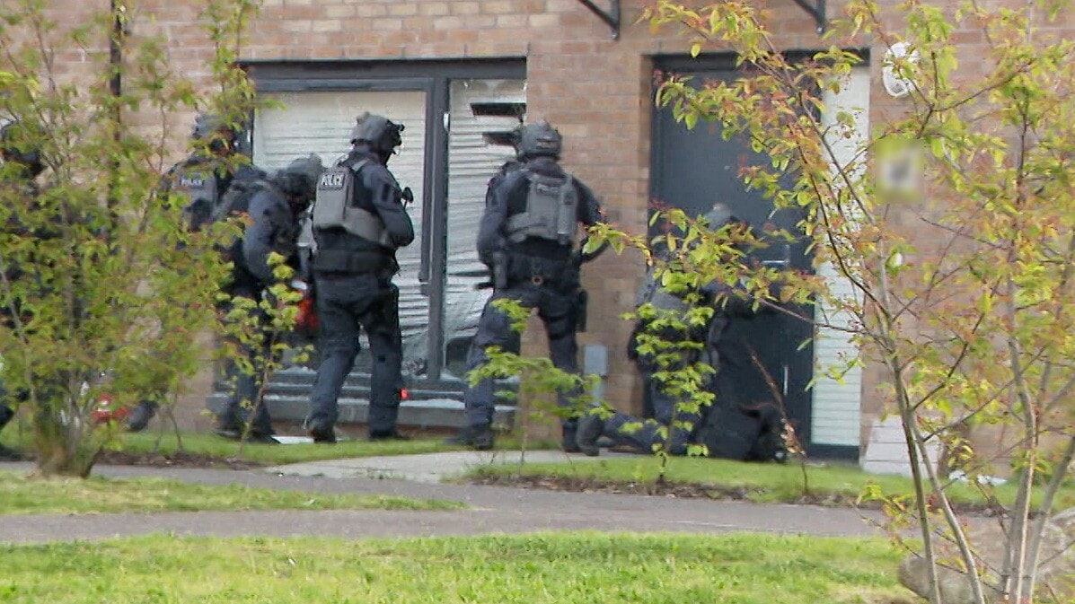 Six to appear in court in connection with gang war after police raid homes