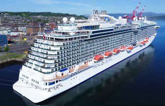 Massive cruise ship carrying more than 4,000 passengers docks at Scottish port