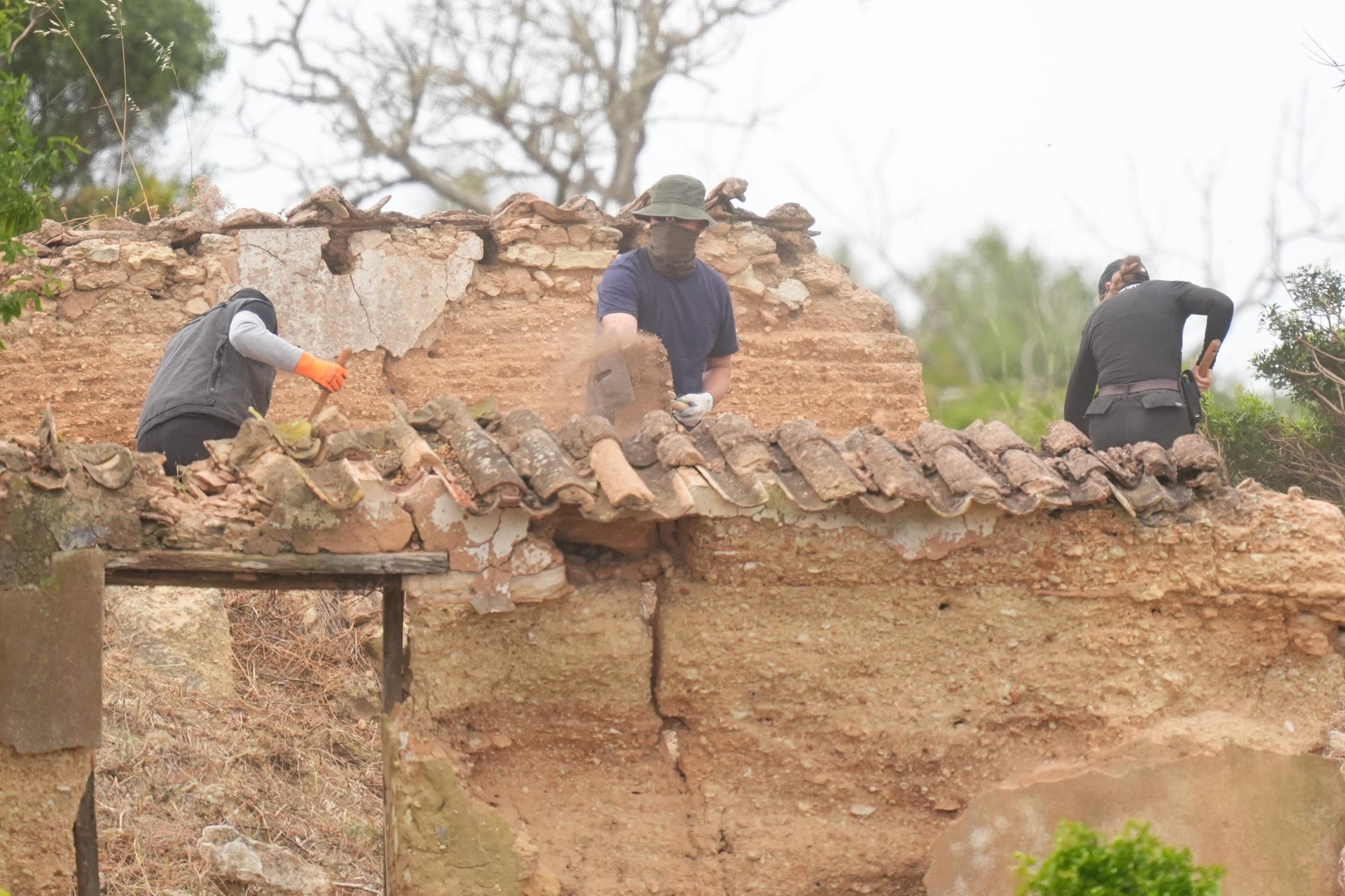 Teams dug, shifted rocks and cleared scrub as the work continued on Tuesday (James Manning/PA).