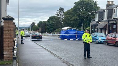 Woman dies after being seriously injured on Dundee street as man arrested