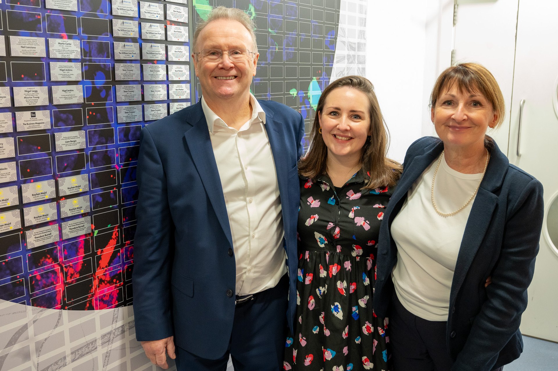 Theo Burrell with her parents Marion and Ian (Brain Tumour Research/PA).