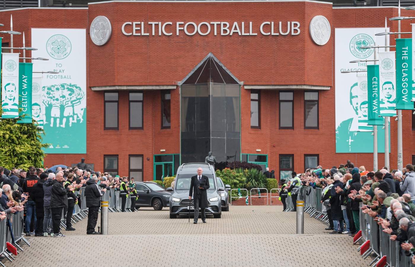 The funeral cortege of former Celtic legend and Lisbon Lion John Clark passes by Celtic Park.