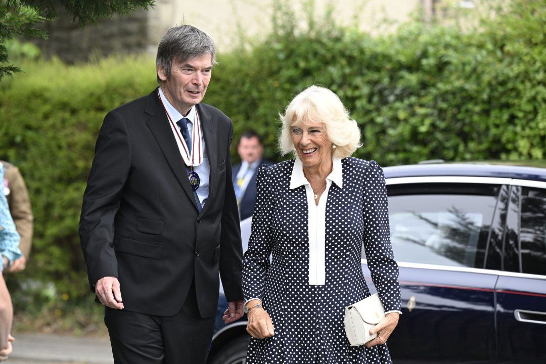 Queen Camilla laments library closures during visit to community hub