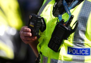 Man arrested after ‘displaying terror group poster in his window’
