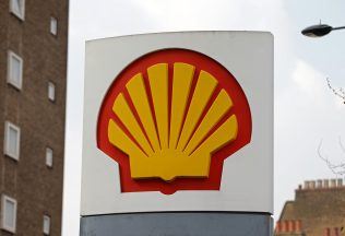 Shell profits fall as trading hit by volatile markets