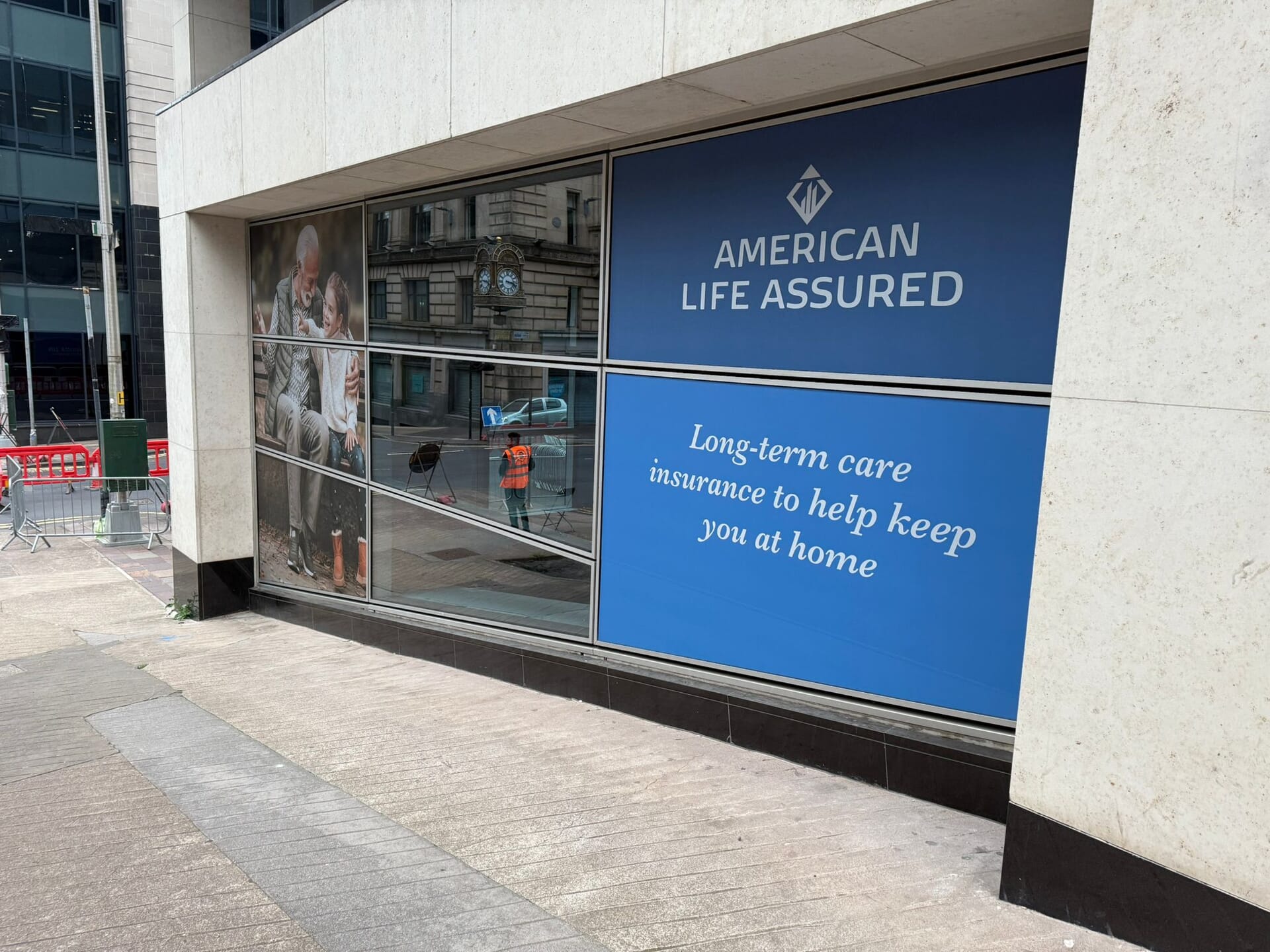 A building in Glasgow has been transformed into an "American Life Assured" insurance building.