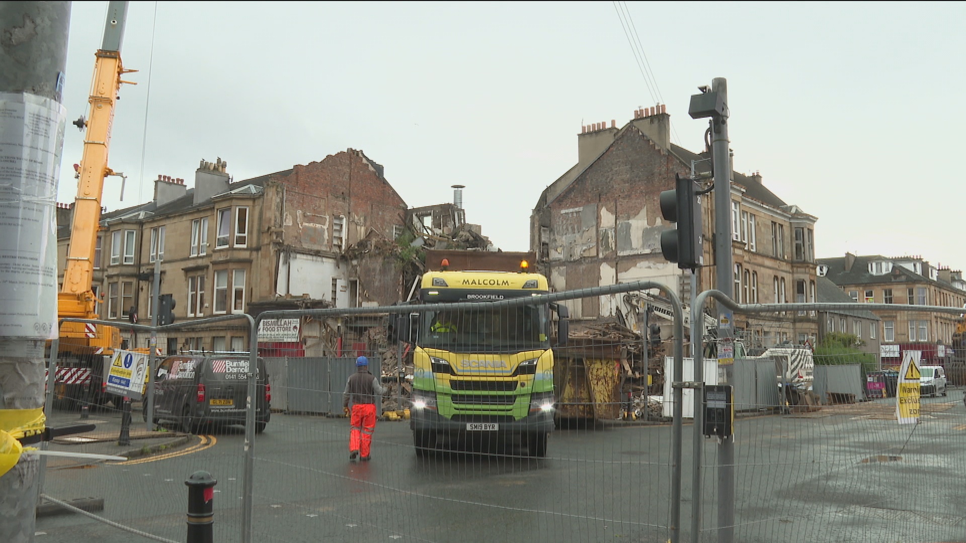 Homes evacuated after fire damaged tenement collapses