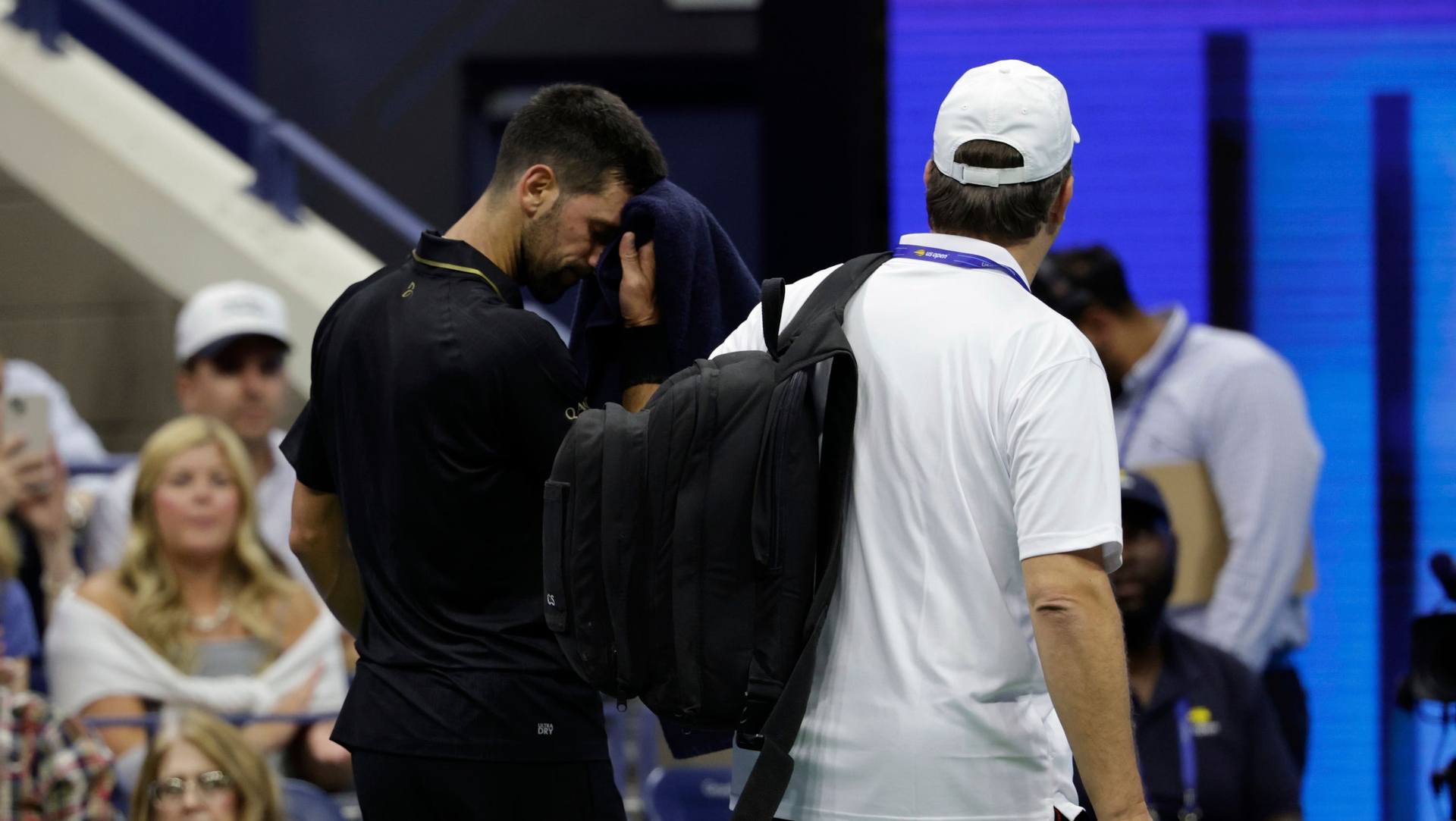 Novak Djokovic headed off court for medical treatment.