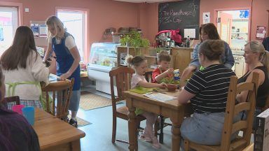 Dundee families cook up global flavours and fight food waste at Signpost International’s community kitchen