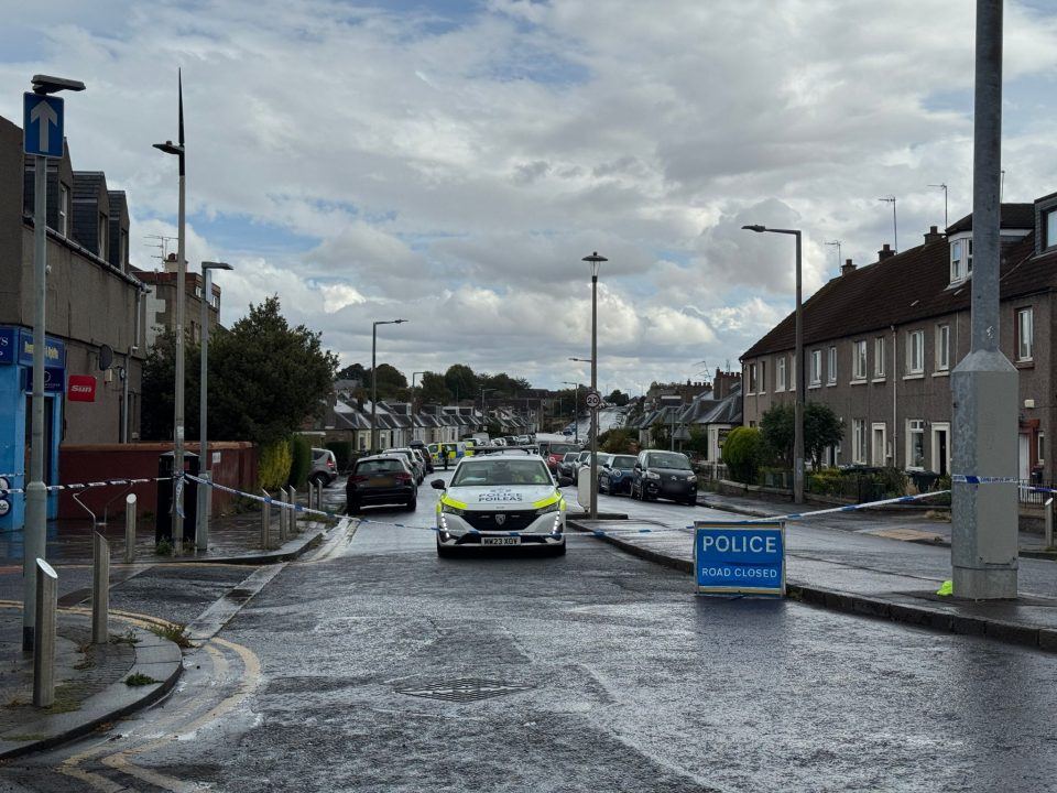 Man arrested after disturbance at Edinburgh property closes road