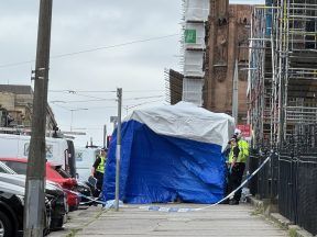 Street cordoned off and police tent erected after man falls on Edinburgh street