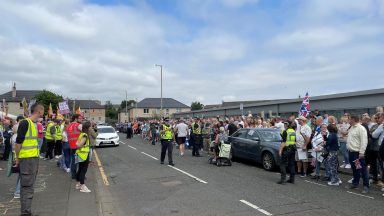 Anti-racism demonstrators stage counter-protest outside asylum seekers hotel