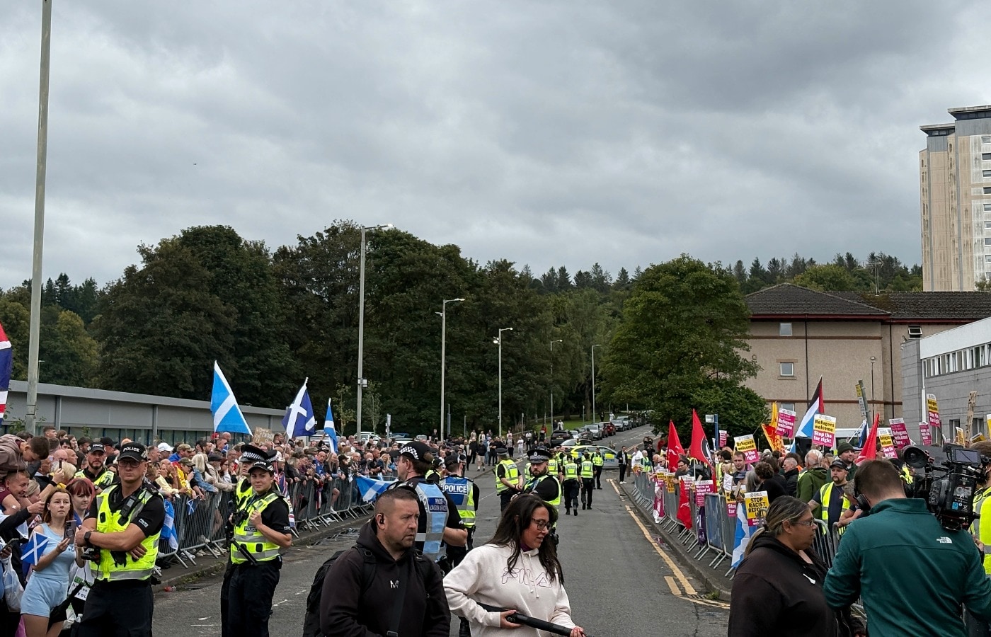 Police separated both sides behind barriers.