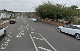 Man arrested after disturbance at Edinburgh property closes road