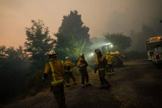 Spain and Portugal battle wave of wildfires as temperatures expected to rise