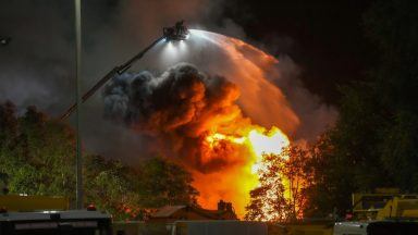 Firefighters tackle large blaze engulfing scrapyard in Elgin through night