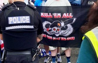 Man charged over ‘offensive banner’ at asylum hotel protest