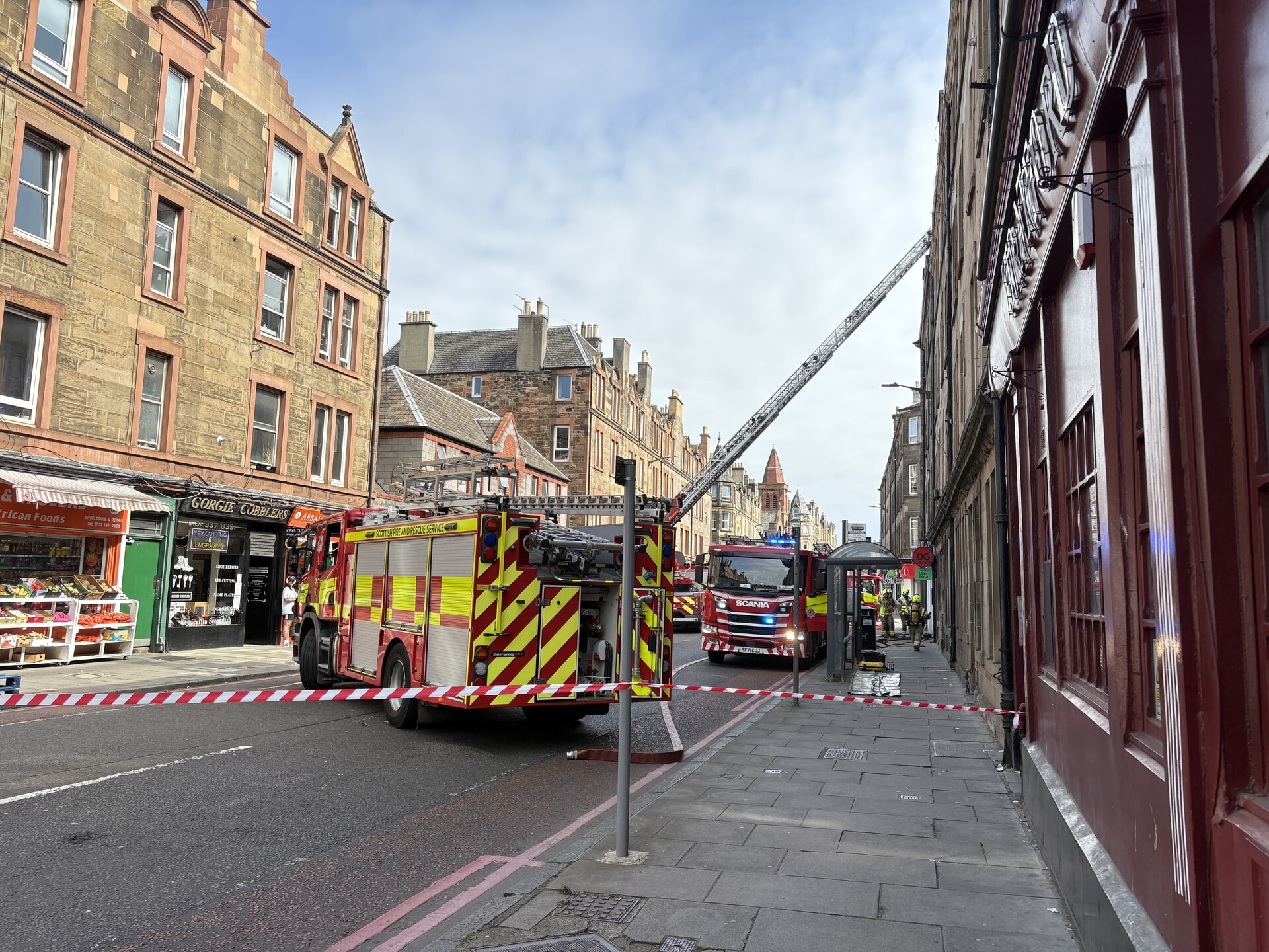 Three fire engines and a height appliance are in attendance.