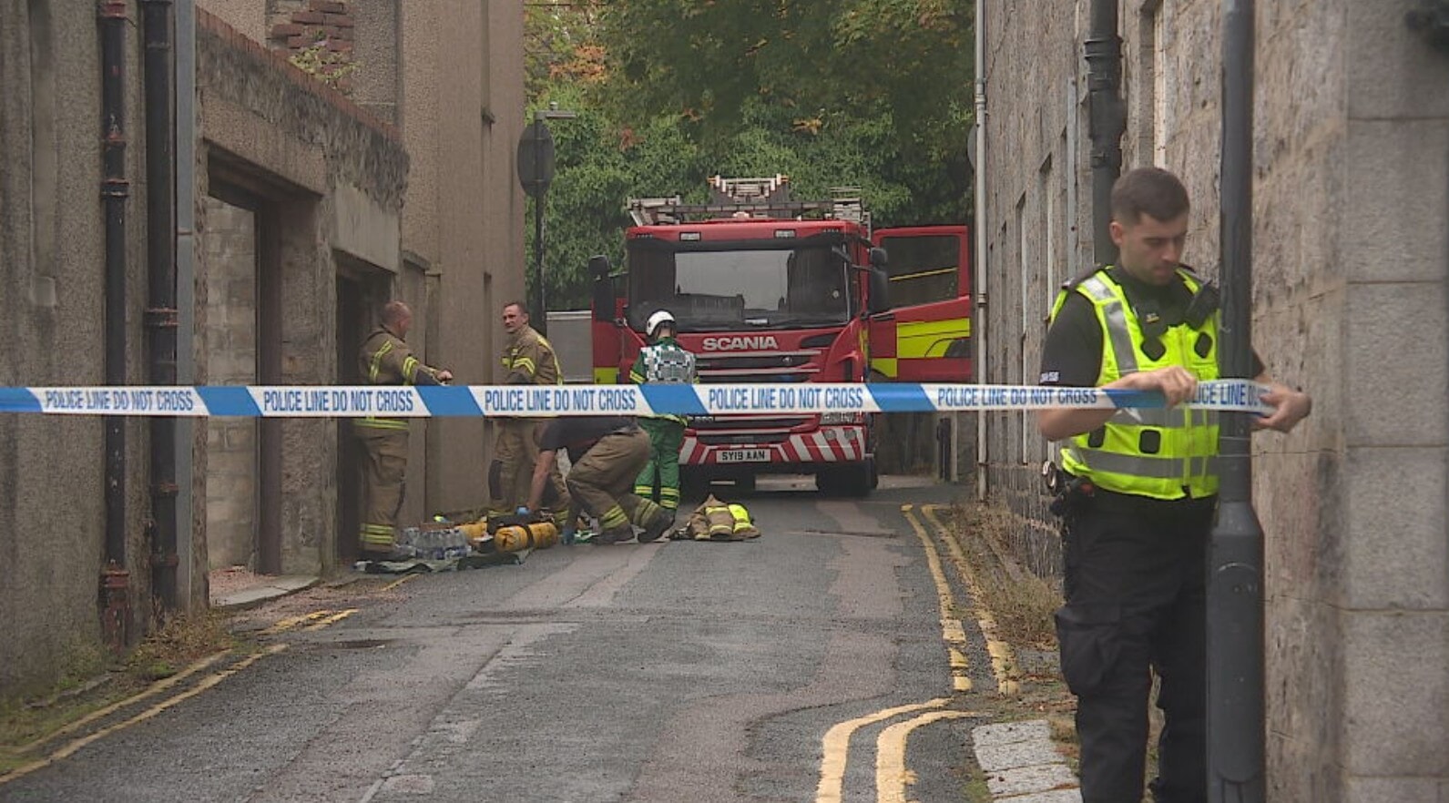 Fire crews are still on the scene of the building blaze.