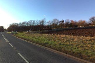 Road closed in both directions due to fire at farm in  East Lothian as man arrested