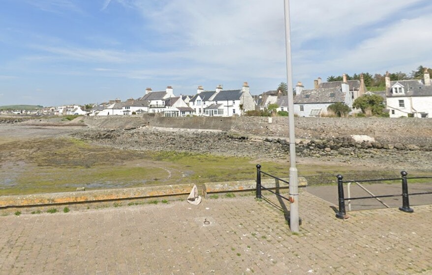 Woman, 94, airlifted to hospital after car goes over wall and onto rocks at Port William harbour