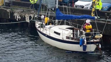 Lifeboat called to rescue sinking yacht run aground in Portree bay