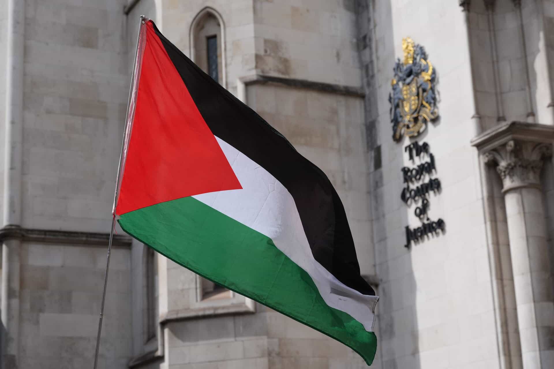 A Palestinian flag outside The Royal Courts Of Justice in central London (Jonathan Brady/PA)