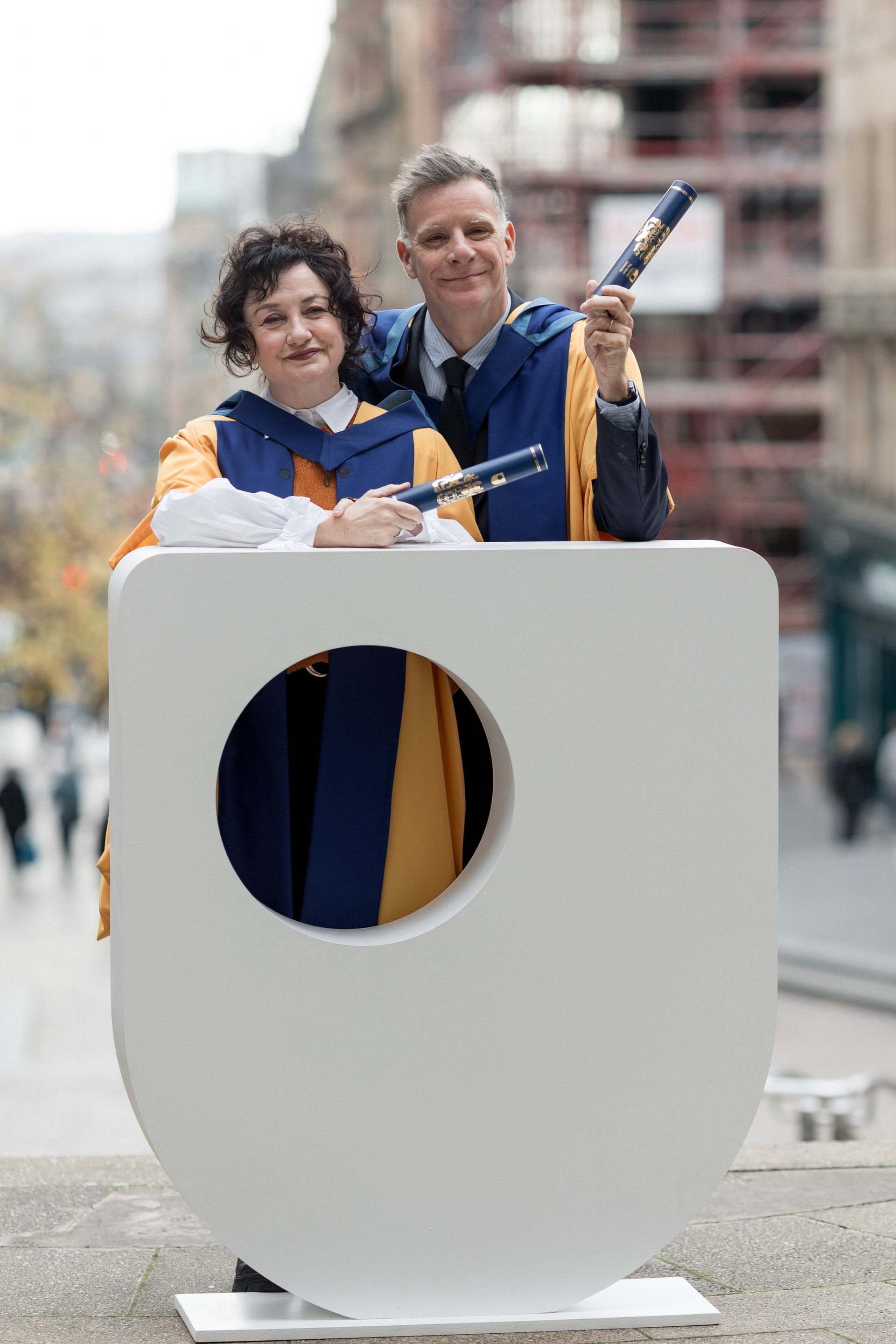Lorraine McIntosh and Ricky Ross were among hundreds of graduates at the Open University ceremony on Friday (Kathryn Tuckerman/Open University/PA).