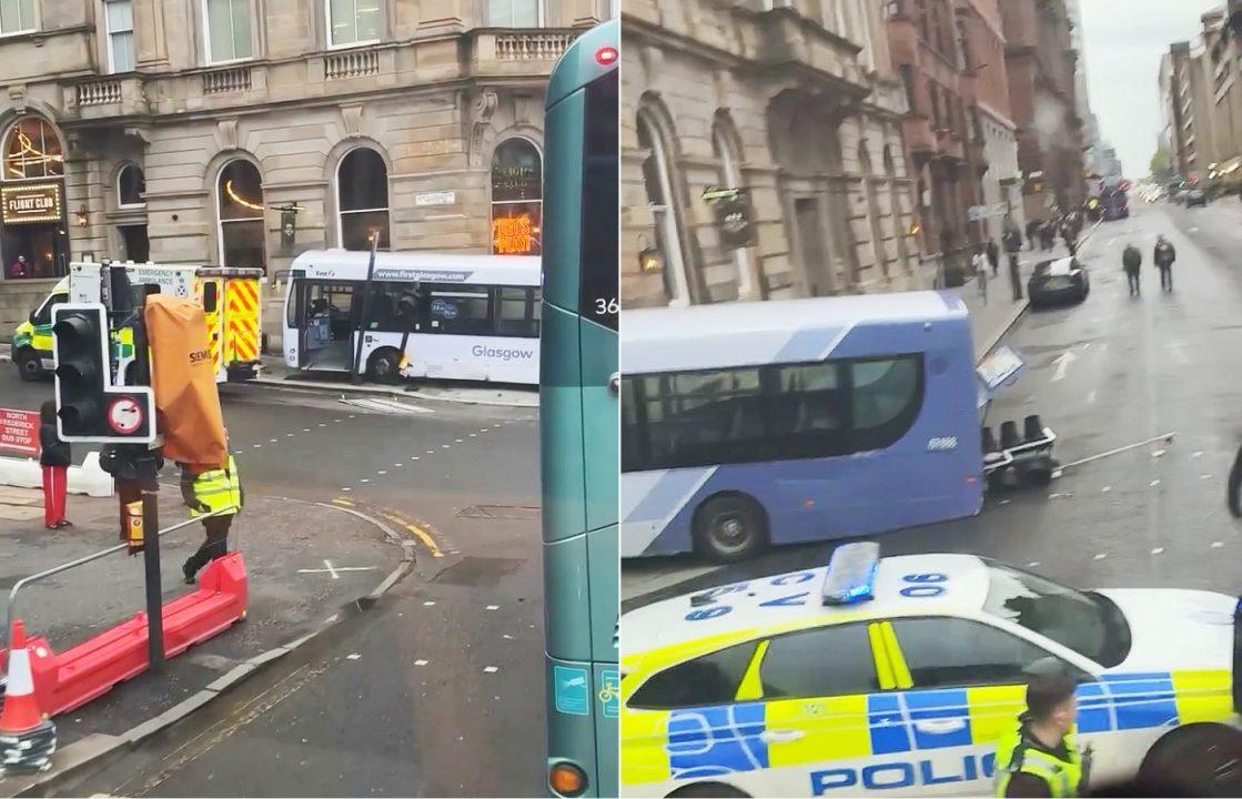 Driver in hospital after bus crashes into building on George Square in Glasgow