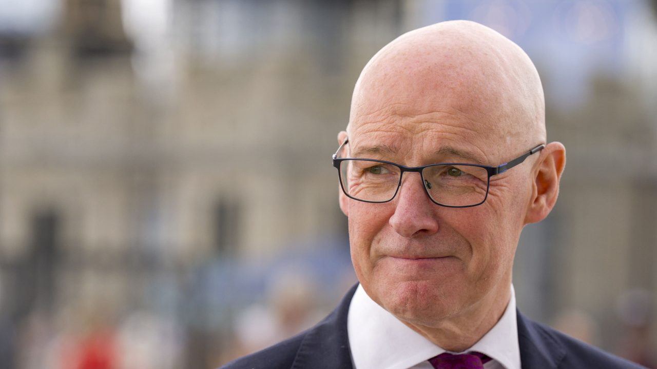 We have to try and get on, says Swinney of Trump