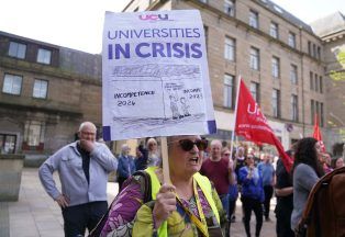 MSPs told further job losses could be required at Dundee University