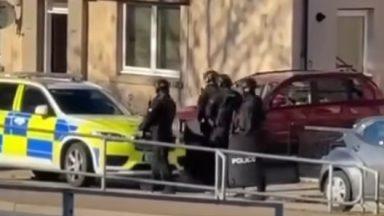 Woman, 37, charged after armed police raid Aberdeen homes