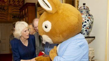 Queen meets Peter Rabbit as she wishes reading charity ‘happy 100th birthday’
