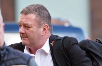 Police officer caught with six shotguns and weapons surrended to him at his home