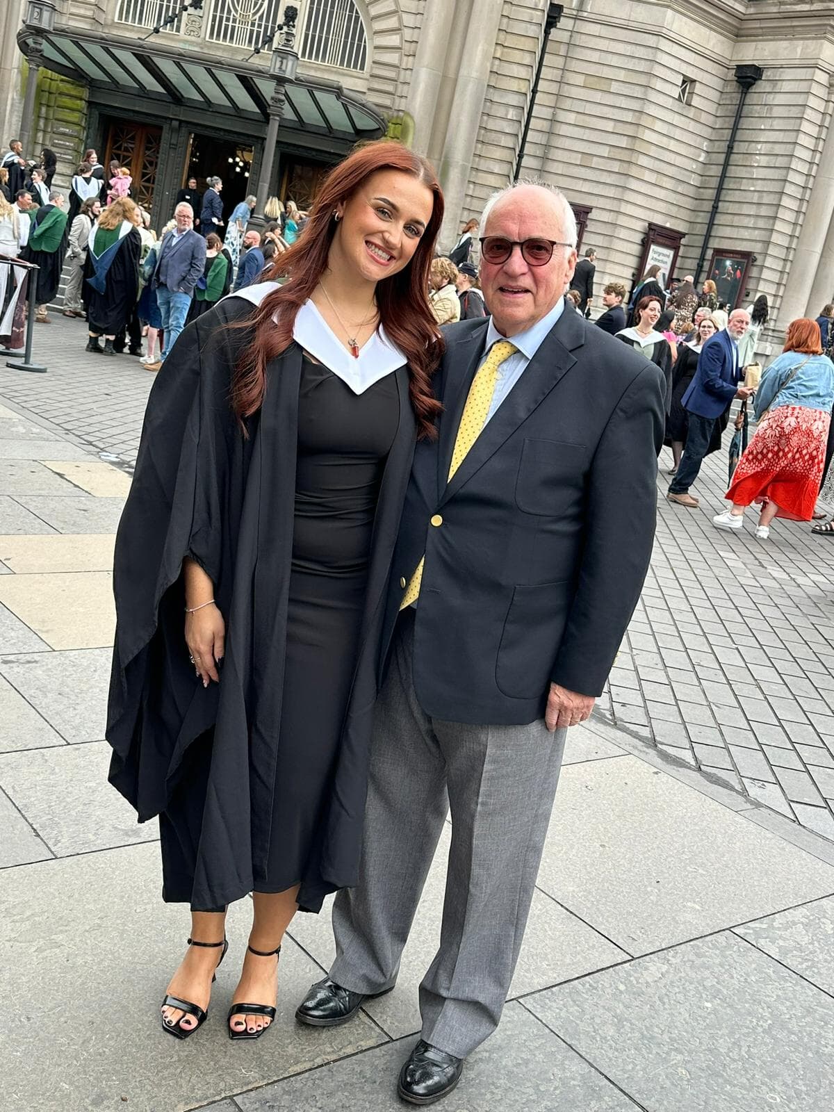 George Morris with his granddaughter, Hannah, at her graduation last year.