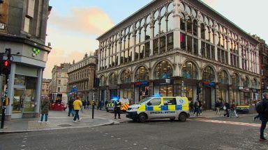 Man taken to hospital and street cordoned off after Glasgow city centre assault