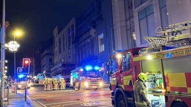 Fifty firefighters tackle blaze as Glasgow city centre street sealed off and H&M store evacuated