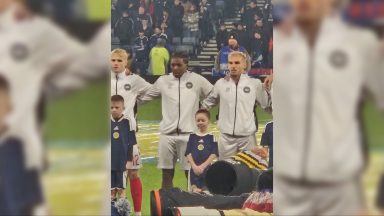 Dad’s pride as mascot daughter cheers Scotland to World Cup spot