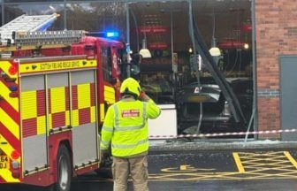 Two cut from car after ‘learner’ driver crashes into Milngavie Home Bargains shop