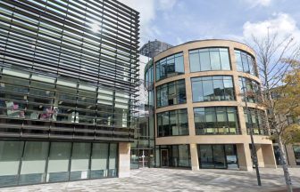 Fourth person charged with terrorism offences over protest at UK Government building