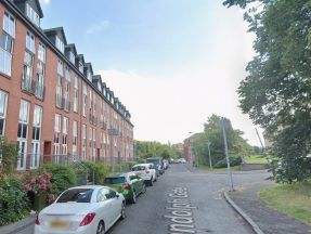 Building evacuated in Glasgow after man found dead in flat